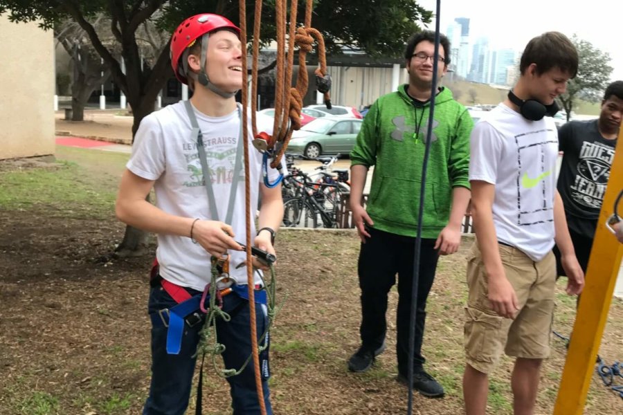 Austin, TX: A student prepares to ascend the CaveSim tower