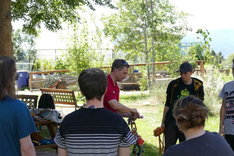 Colorado Springs, CO: Students in a Outdoor Leadership class learn about rope access equipment for some cave rescue practice