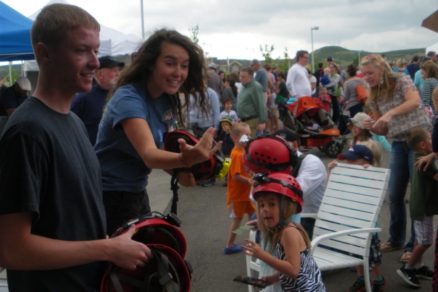 Lonetree, CO: Enthusiastic CaveSim staff help participants gear up to explore