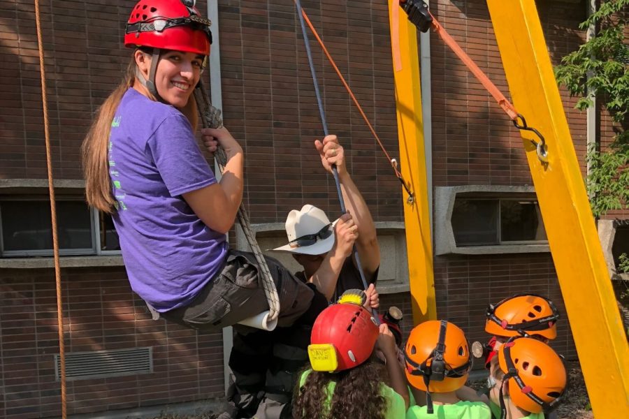 Helena, MT: Summer campers lift their counselor with the help of CaveSim staff