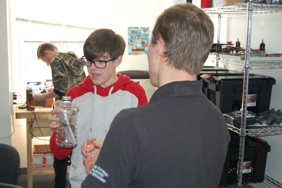 Colorado Springs, CO: A student discusses their CaveSim STEM lab with the CaveSim inventor